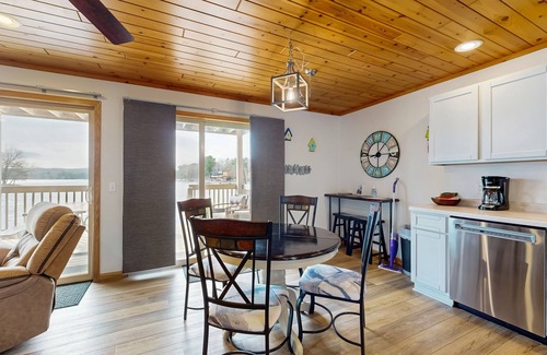 Lake Delton House | Inviting lakefront condo - amazing views, beach access, fireplace, dock, AC, W/D