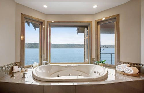 Olalla House | Inviting waterfront home with kayaks, dock, firepit, central AC, & W/D