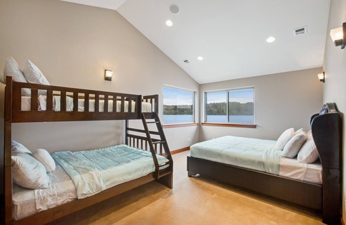 Olalla House | Inviting waterfront home with kayaks, dock, firepit, central AC, & W/D