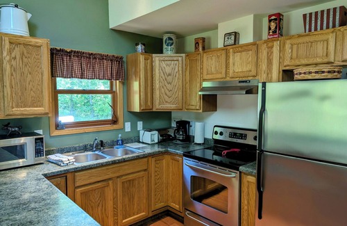 La Pointe House | Island Fox - Home nestled in the Woods with Screened-in Porch!