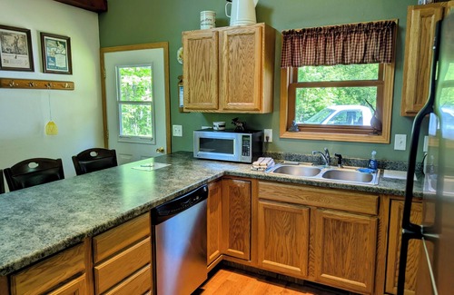 La Pointe House | Island Fox - Home nestled in the Woods with Screened-in Porch!