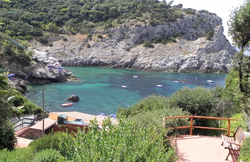 Cala Piccola Apartment | Relax and sea: one room with patio and pool