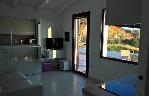 Villaggio delle Mimose Apartment | Comfortable apartment with pool with stunning views near Villasimius