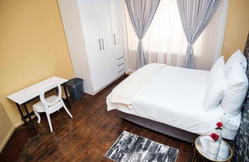Greater Johannesburg Metropolitan Area Apartment | Izimbalizethu