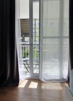 Mactan Export Processing Zone Apartment | JC SpaceRentals 127B Amani Grand Resort Residences, balcony pool view, Ground floor, 5 mins frm airport, free wifi, Netflix