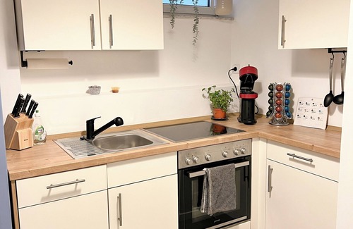 Maximin Apartment | JUPAS° | Red Rock Home - Balcony & Parking lot