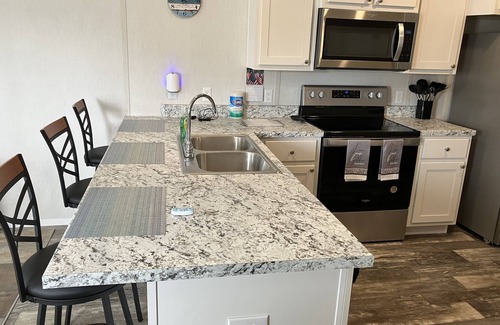 Edgemont House | Just minutes from Hill Creek Park and marina with room for your boat.