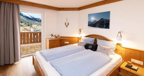 Tannheim House | Käserstube Ferienwohnungen