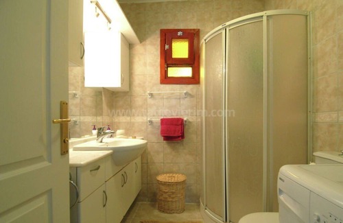 Gumusluk Apartment | Karya apartment Gumusluk Bodrum with seaview and communal site pool.