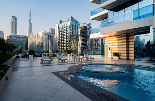 Business Bay Apartment | Kasco Homes - Waves Tower by the Canal Business Bay