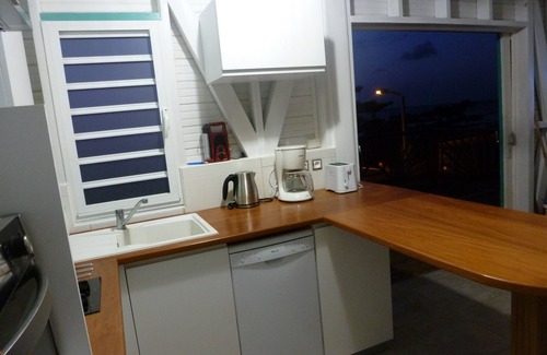 Rifflet Apartment | Katalo plage, duplex tortue Caret. les pieds dans l'eau. deshaies