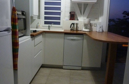 Rifflet Apartment | Katalo plage, duplex tortue Caret. les pieds dans l'eau. deshaies