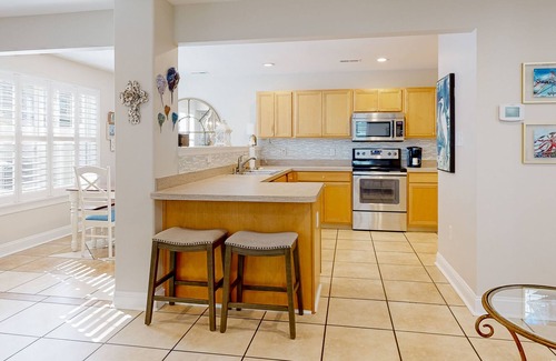 Keys Of Marsh Harbor House | Keys of March Harbor home with on-site pool, tennis, private patio & sunroom