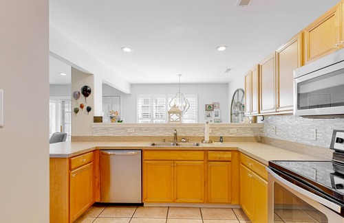 Keys Of Marsh Harbor House | Keys of March Harbor home with on-site pool, tennis, private patio & sunroom