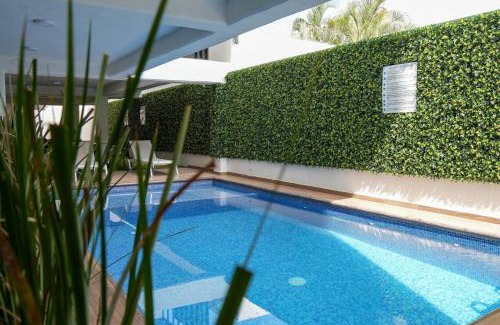 Downtown Mazatlan Apartment | King Bed Retreat Parking Ideal Workspace