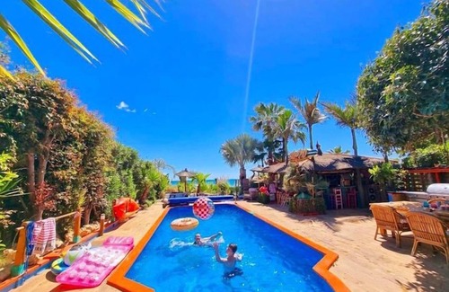 Vera Beach Villa | Kokomo on the beach with heated swimming pool