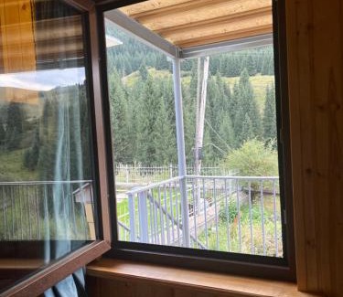 Almaty Province Hotel | Kolsay Tanbalytas Wood panel house