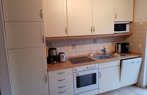 Tossens Apartment | Lüttjes Diekhuus - Ferienwohnung Strandkorb