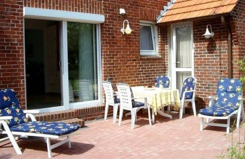 Tossens Apartment | Lüttjes Diekhuus - Ferienwohnung Strandkorb