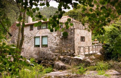 Caldas de Reis Ski Chalet | La encantadora casa del río de CALDAS DE REIS.