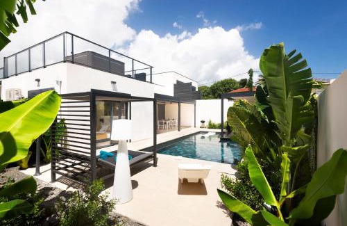 Dunoyer Villa | Lagon Paradis - 6 Villas individuelles avec Piscine ou Jacuzzi - Loc Voiture Cabriolet ou SUV