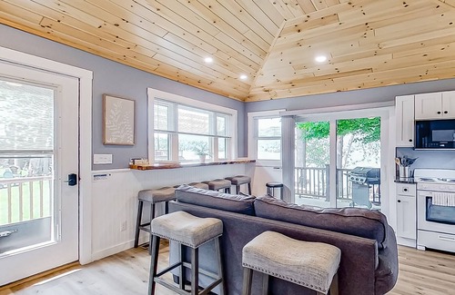Lake George Cottage | Lake cabin with waterfront views, shared dock, private deck, grill, & kayaks