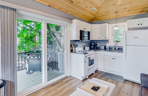 Lake George Cottage | Lake cabin with waterfront views, shared dock, private deck, grill, & kayaks