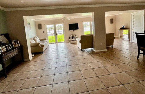 Miami Gardens House | Lake front 3 bed house with sunset views and hot tub, ski in your own back yard