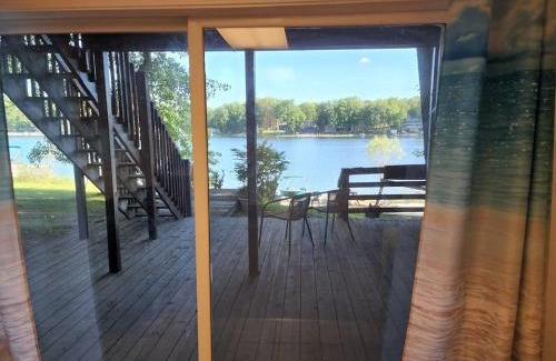 Le Roy House | Lake Front Cottage on Private All-Sports Lake.