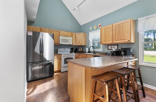 Paw Paw Lake House | Lake Front, Hot Tub, Game Room, Kayak/SUPs, Firepit, Private, Pet Friendly
