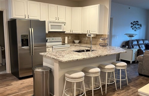 Sunrise Beach Condo | Lake Lodge Condo overlooking The swimming pool and the￼ Lake of the Ozarks