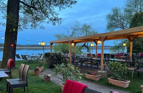Mellensee Apartment | Lake view apartment direct water access up to 4 pers. - Restaurant am Wildpark