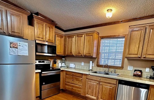 Kirby House | Lake view cottage on Lake Greeson with private hot tub!