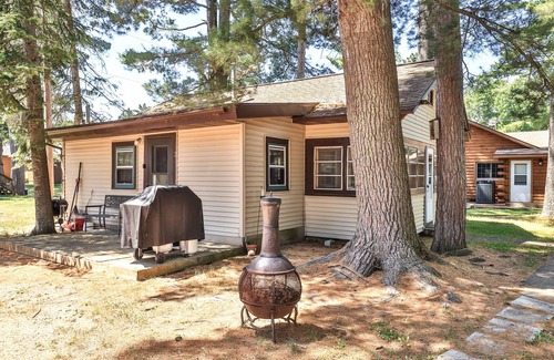 St Germain Cabin | Lake view, dog-friendly cabin with porch & shared dock, swimming area, firepit