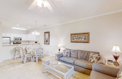 Little River Condo | Lake-view ground-floor condo with screened patio, W/D, & pool