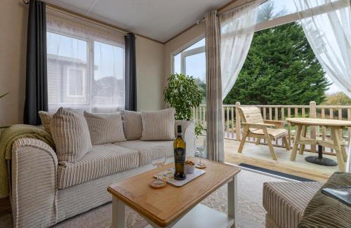 Cheriton Bishop Ski Chalet | Lake View Holiday Home - Fishing Lakes, Heated Outdoor Swimming Pool 500yrds on Sister Park , Pool Open April to September