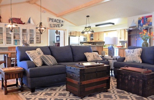 Mount Ida Cottage | Lake view three bedroom, three bath cottage with private hot tub overlooking Lake Ouachita. by RedAwning