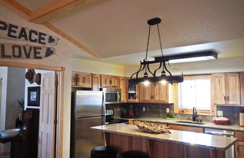 Mount Ida Cottage | Lake view three bedroom, three bath cottage with private hot tub overlooking Lake Ouachita. by RedAwning