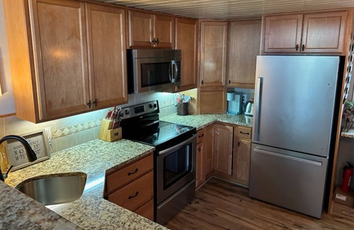Gilford Condo | Lake-view townhome at Samoset with pools, beach, WiFi, & AC