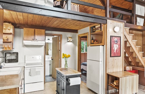 Mason County Cabin | Lakefront A-Frame Cabin with King Beds, Boat, Hot Tub