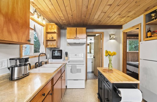 Mason County Cabin | Lakefront A-Frame Cabin with King Beds, Boat, Hot Tub