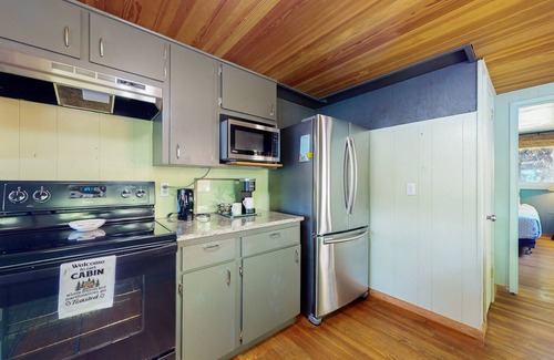 Grapeview House | Lakefront beauty with private dock, kayak, pedal boat & fantastic water view