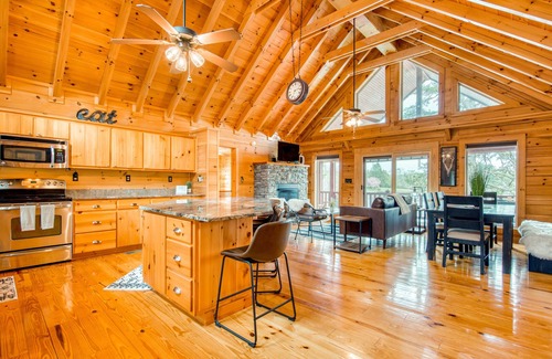 Mills River Cabin | Lakefront cabin & tiny home with a firepit, wet bar, washer/dryer, dock