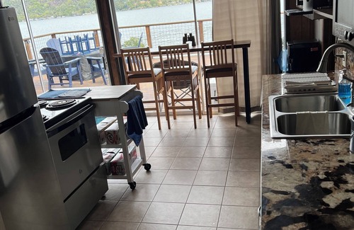 Clearlake House | Lakefront Cabin with A/C, Private Beach, Boat Launch & 180° Views of Clear Lake