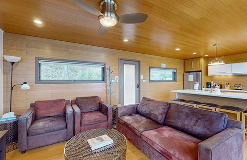 Valois House | Lakefront contemporary gem with decks, lake views & pebble beach