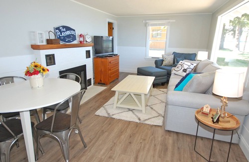 Glen Arbor Cottage | Lakefront cottage with amazing views, a spacious deck, grill, cable & dock