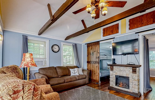 Winnisquam Cottage | Lakefront cottage with WiFi, full kitchen, dock, deck & game room