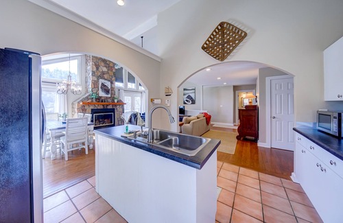 Lakemont House | Lakefront gem with deck, grill, boathouse/dock, fireplace, central AC, &WiFi