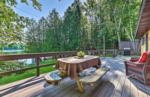 Curtis Township Cottage | Lakefront Hideaway w/Dock, Kayaks, Fire Pit!