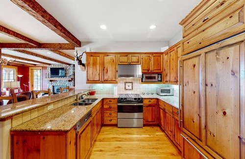 Steamboat Springs House | Lakefront home with a private dock, balcony, grill, gas fireplace, W/D, and AC